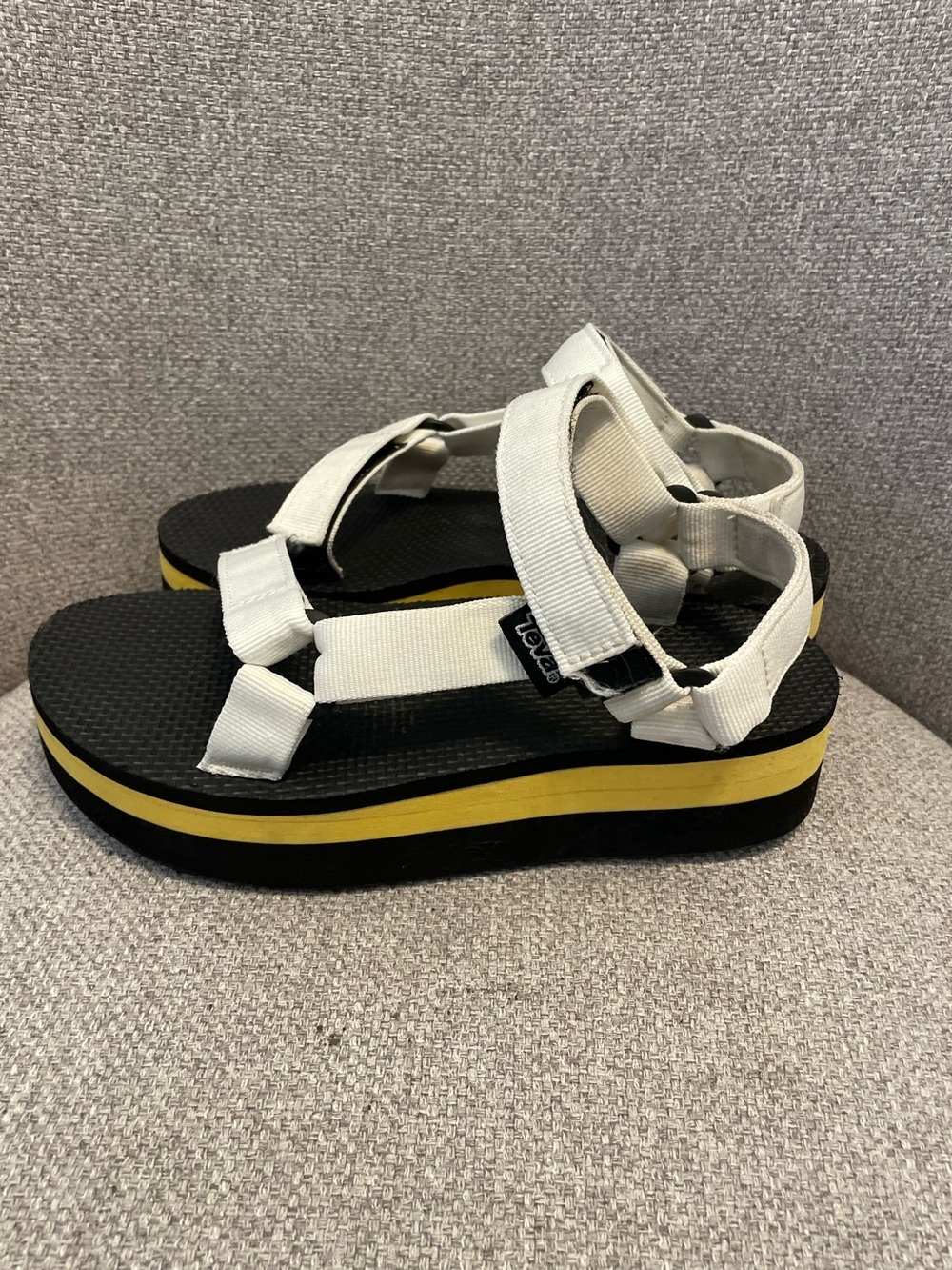 TEVA- Women's size 7 Flatform Universal in the White/Yellow/Black colorway.